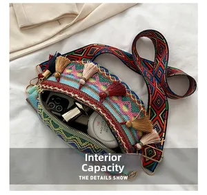 Internal view of ethnic woven crossbody bag with colorful tassels and wide strap
