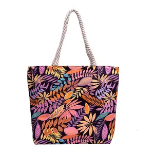 Grand sac cabas en toile violette à motif tropical et poignées en corde blanche