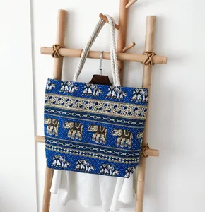 Detailed shot of ethnic elephant print canvas tote with thick white rope handle