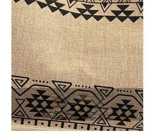 Close-up of ethnic linen tote bag fabric showing woven texture and geometric prints