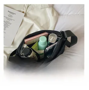 Interior view showing the large storage capacity of this black quilted hobo bag