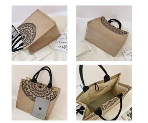Detalle de bolsa de yute que muestra forro interior, bolsillo con cremallera y espacio