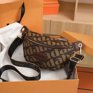 Deep brown leather crossbody chest bag with monogram print and wide webbed strap