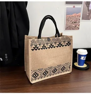 Close-up of ethnic geometric prints on durable natural burlap linen tote shopping bag