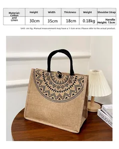 Linen tote bag with black geometric print and size specs 30x35x18cm shown on wood table