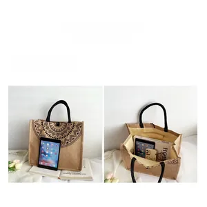 Linen tote bag with black mandala pattern featuring large interior and zipper pocket