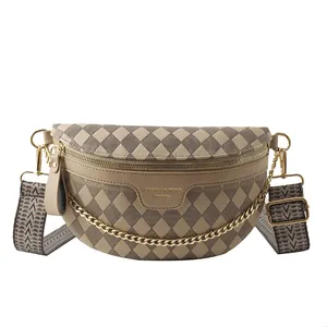 Brown checkered crossbody chest bag with adjustable patterned wide strap and gold zipper