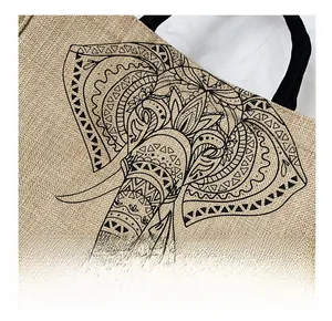 Detail shot of the bohemian elephant print on natural jute fabric tote bag