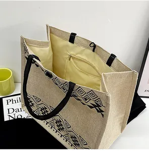 Detail view of woven tote bag with internal zipper pocket and bright yellow lining
