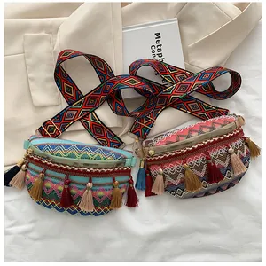 Close-up of bohemian lace chest bags with geometric embroidery and colorful tassels