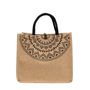 Eco-friendly jute tote bag with black geometric sun pattern and round handles