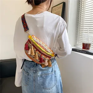 Bohemian woven crossbody bag with colorful tassels and geometric jacquard strap for women