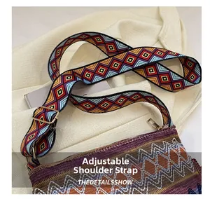 Close-up of bohemian woven bag featuring an adjustable colorful geometric shoulder strap