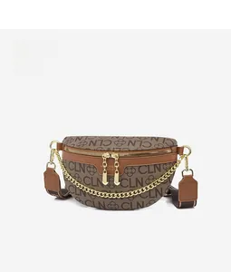 Detail view of vintage brown crossbody bag with gold chain and CLN monogram pattern