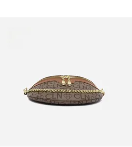 Detail view showing the bottom construction of the brown monogram chain crossbody bag