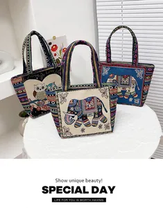 Detail of vintage knit tote bags featuring ethnic owl and elephant embroidery patterns