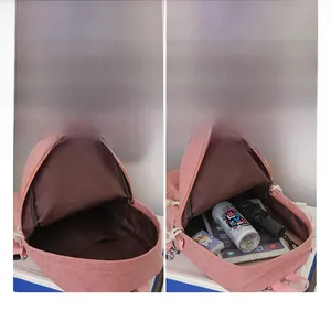 Detail showing the spacious interior compartment and textured corduroy of the pink backpack