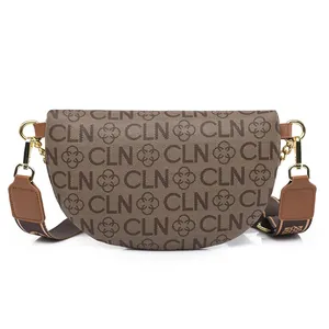 Classic monogram saddle bag in brown and khaki canvas with a wide leather strap