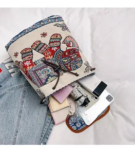 Detailed interior view of ethnic embroidered elephant drawstring bag with high capacity