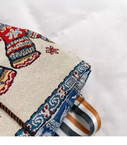 Detailed macro of ethnic jacquard fabric texture and colorful striped webbing strap