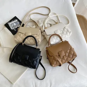 Quilted crossbody bag set with woven handles in beige, white, black, and brown colors