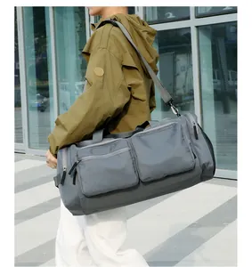 Détails du sac de voyage gris en nylon imperméable avec doubles poches et filet