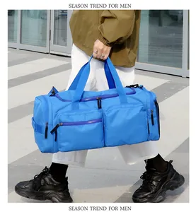 Sac de voyage bleu grande capacité avec séparation humide-sec et poches zippées pratiques