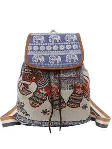 Ethnic elephant embroidery drawstring backpack in bohemian cream and blue canvas