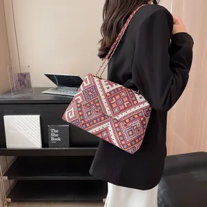 Ethnic geometric pattern flap shoulder bag with red leather chain strap for women