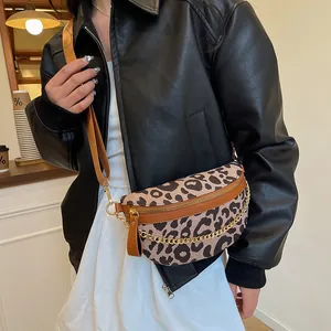 Leopard print crossbody chest bag with linen stitching and golden chain detail