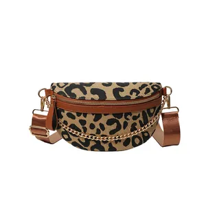 Leopard print canvas crossbody chest bag with brown faux leather trim and gold chain