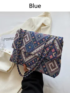 Blue retro chain shoulder bag with ethnic geometric pattern and woven texture