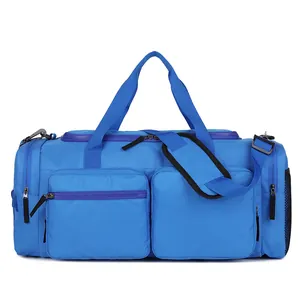Sac de voyage bleu à grande capacité avec séparation sec-humide et bandoulière réglable