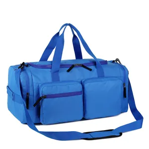 Sac de voyage bleu imperméable avec doubles poignées et bandoulière rembourrée réglable