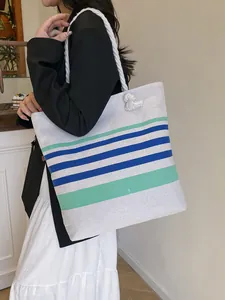 Grande borsa tote in tela con eleganti strisce blu e manici in corda di cotone
