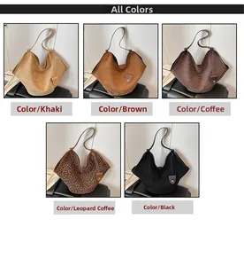 Détail montrant cinq couleurs de grands sacs hobo en daim avec une texture souple
