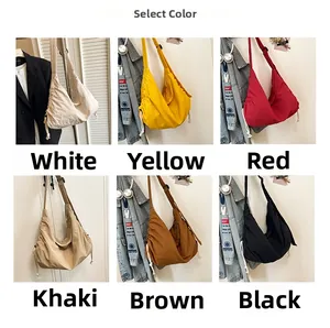 Selection of large nylon hobo bags in white, yellow, red, khaki, brown, and black