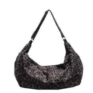 Chic leopard print hobo tote bag with large capacity and stylish fabric finish