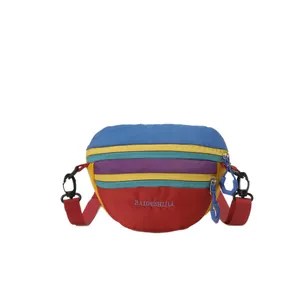 Multicolor nylon fanny pack with adjustable strap and multiple zipper compartments