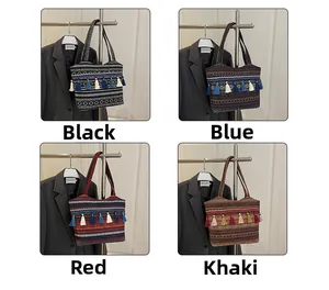 Ethnic jacquard tote bags with colorful tassels shown in black, blue, red and khaki