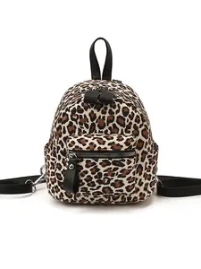 Mini leopard print backpack for women with black adjustable straps and silver zippers