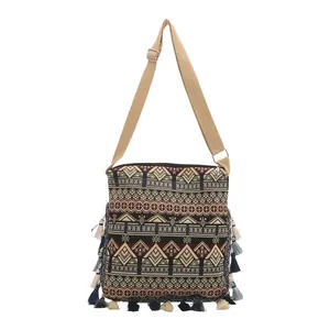 Ethnic geometric jacquard crossbody bag with colorful tassels and adjustable strap