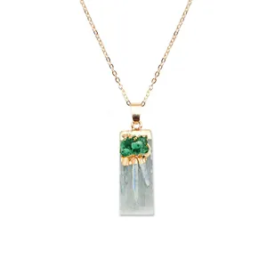 Irregular natural white selenite pendant necklace with green ore and gold-plated trim