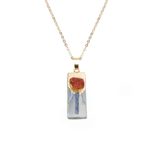 Bohemian rectangle gypsum pendant necklace with blue kyanite and red gemstone