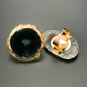 Detailed close-up of natural agate stone rings with gold plating and adjustable band