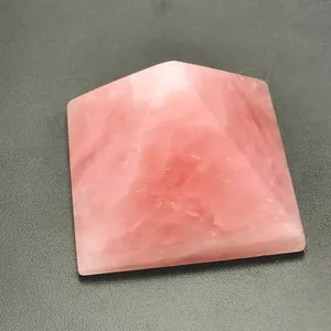 Natural polished rose quartz crystal pyramid stone for energy and meditation décor