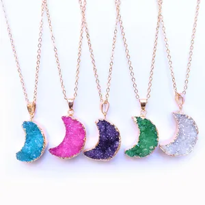 Natural druzy moon pendants on gold chains in five vibrant colors with crystal texture