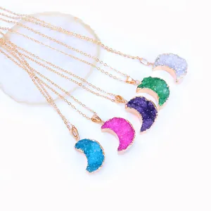 Natural crystal moon pendants in five vibrant colors with elegant gold-plated edges