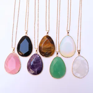 Set of seven faceted teardrop gemstone pendants with gold-plated copper edging and chains