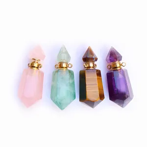 Set van vier natuurlijke kristallen parfumflesjes hangers in rozenkwarts en amethist